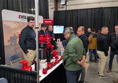 Operators and industry professionals at the Evolution booth at LHOS 2026